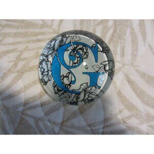 GLASS PAPERWEIGHT WITH THE INITIAL "G" IN BLUE